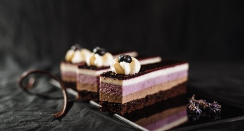 Three,Chocolate,Cakes,On,A,Black,Background.,Mousse,Cake,With